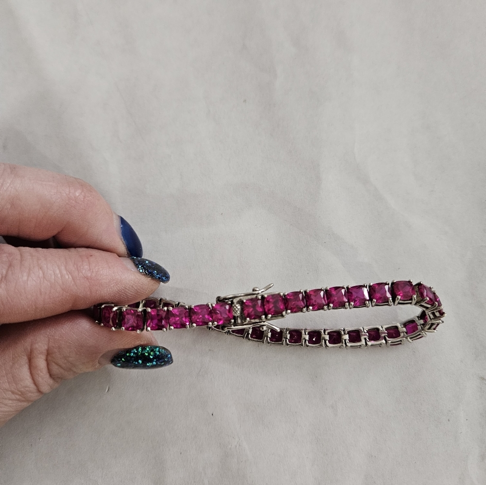 2 CT lab created 925 sterling silver ruby tennis beacelet. 7". EUC.